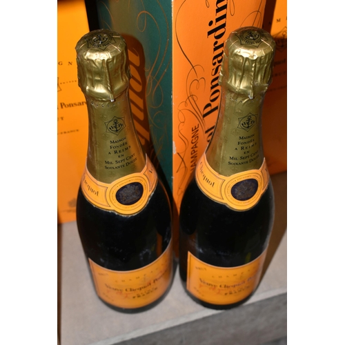 247 - THREE BOTTLES OF  VEUVE CLICQUOT PONSARDIN CHAMPAGNE, one 1960's bottling, 26 fl.oz, two bottles 750... 