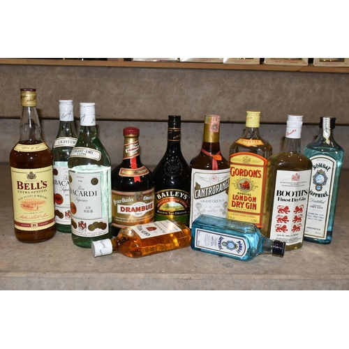 284 - ELEVEN BOTTLES OF ALCOHOL comprising one bottle of Bell's Extra Special Old Scotch Whisky, 40% vol. ... 