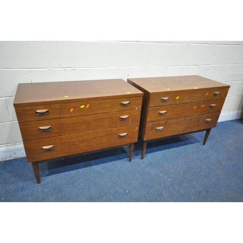 1230 - A PAIR OF WRIGHTON MID CENTURY TEAK CHEST OF THREE LONG DRAWERS, on cylindrical tapered legs, length... 