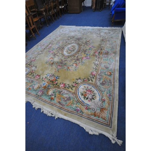 1276 - A VERY LARGE CHINESE WOOLLEN RUG, 408cm x 310cm (condition report: stains in various places, sides a... 