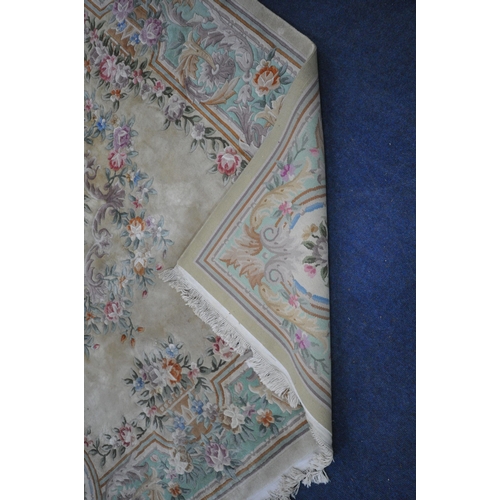 1276 - A VERY LARGE CHINESE WOOLLEN RUG, 408cm x 310cm (condition report: stains in various places, sides a... 