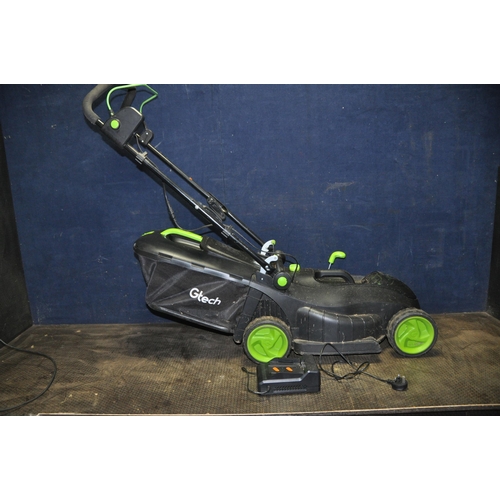 1057 - A G TECH CLM021 CORDLESS LAWN MOWER with grassbox, one battery and charger (PAT pass and working)