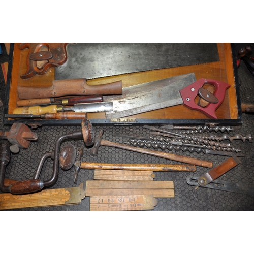 1061 - A VINTAGE CARPENTERS TOOLBOX CONTAINING TOOLS with lock and one key including three wooden spokeshav... 