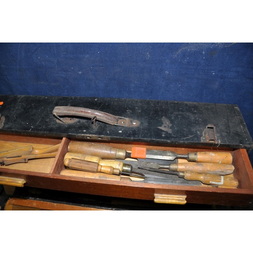 1061 - A VINTAGE CARPENTERS TOOLBOX CONTAINING TOOLS with lock and one key including three wooden spokeshav... 