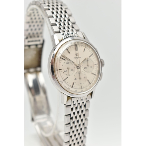 1 - AN 'OMEGA' WRISTWATCH, circa 1965, hand wound movement, round silvered chronograph tachymeter dial, ... 