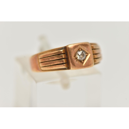 10 - A LATE VICTORIAN DIAMOND SIGNET RING, old cut diamond claw set in a polished square mount, textured ... 