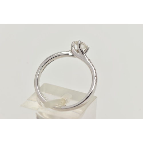 17 - A MODERN 18CT WHITE GOLD DIAMOND RING, a round brilliant cut diamond with faceted girdle, approximat... 