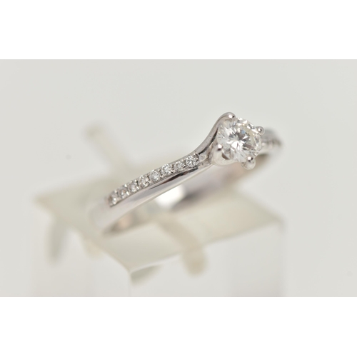 17 - A MODERN 18CT WHITE GOLD DIAMOND RING, a round brilliant cut diamond with faceted girdle, approximat... 