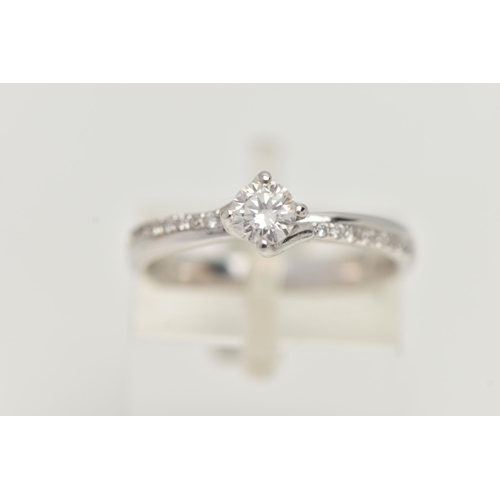 17 - A MODERN 18CT WHITE GOLD DIAMOND RING, a round brilliant cut diamond with faceted girdle, approximat... 