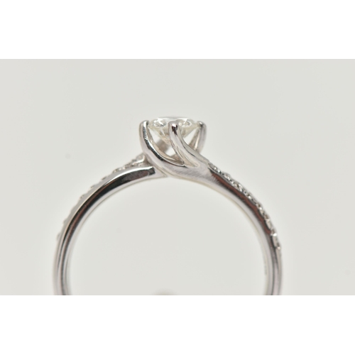 17 - A MODERN 18CT WHITE GOLD DIAMOND RING, a round brilliant cut diamond with faceted girdle, approximat... 