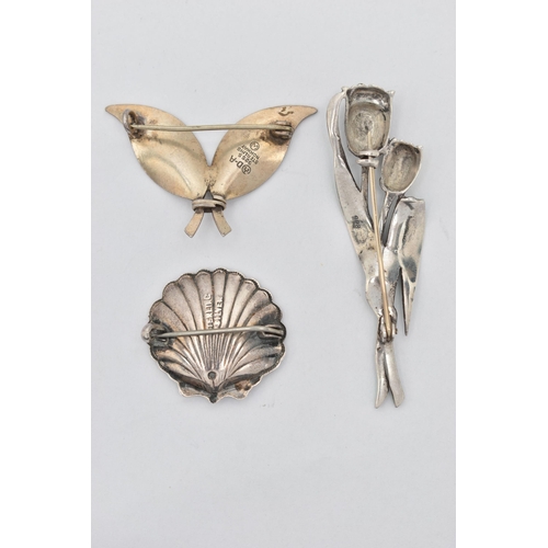 20 - A 'DAVID ANDERSEN' BROOCH AND TWO ADDITIONAL BROOCHES, a double leaf brooch with white enamel detail... 