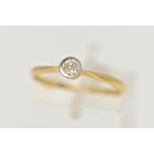 21 - A DIAMOND SINGLE STONE RING, an old cut diamond collet set with milgrain detail, leading on to a yel... 