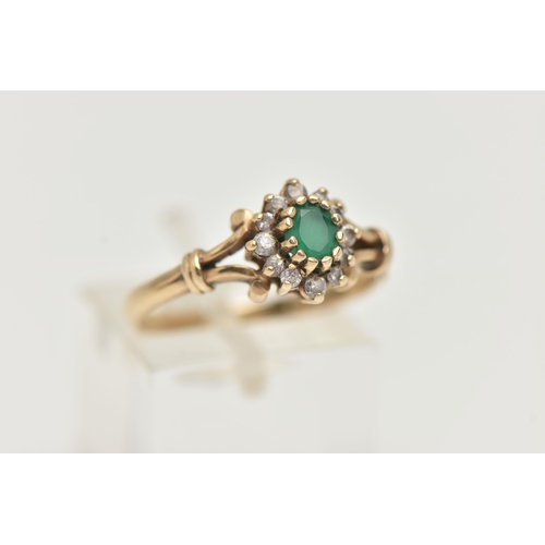 24 - A 9CT GOLD GEMSET RING, an oval cut green chalcedony, set with a surround of circular cut cubic zirc... 