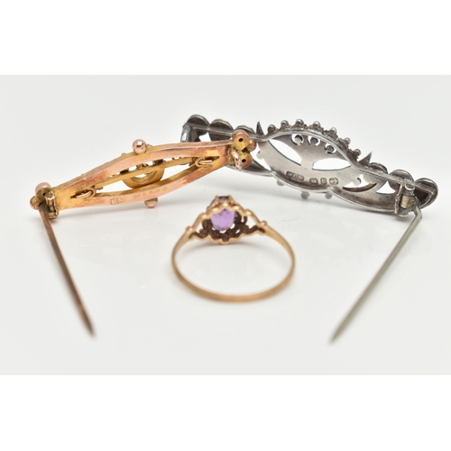 25 - A RING AND TWO BROOCHES, an oval cut amethyst, prong set in yellow gold, leading on to scrolled bifu... 