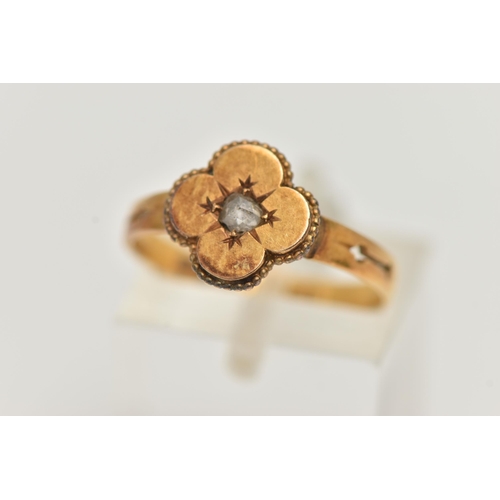 27 - A LATE VICTORIAN 18CT GOLD AND DIAMOND RING, a single rose cut diamond, set in a quatrefoil design m... 