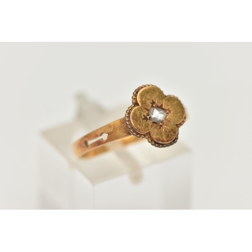 27 - A LATE VICTORIAN 18CT GOLD AND DIAMOND RING, a single rose cut diamond, set in a quatrefoil design m... 