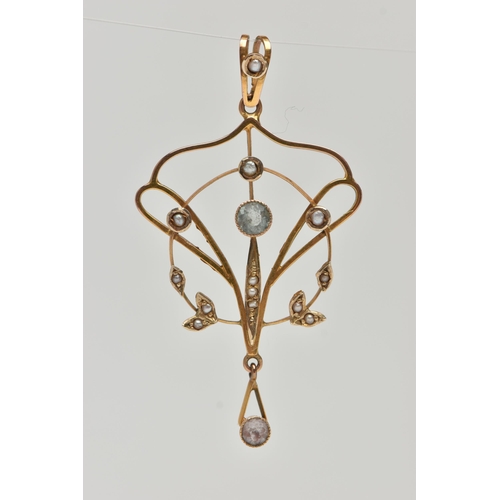 31 - AN EARLY 20TH CENTURY LAVALIER PENDANT, seed pearls and aquamarine set in an open work art nouveau s... 