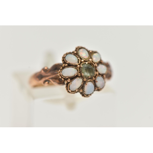 32 - A MID VICTORIAN 15CT GOLD OPAL RING, principally set with a square cut quartz, with a surround of ei... 