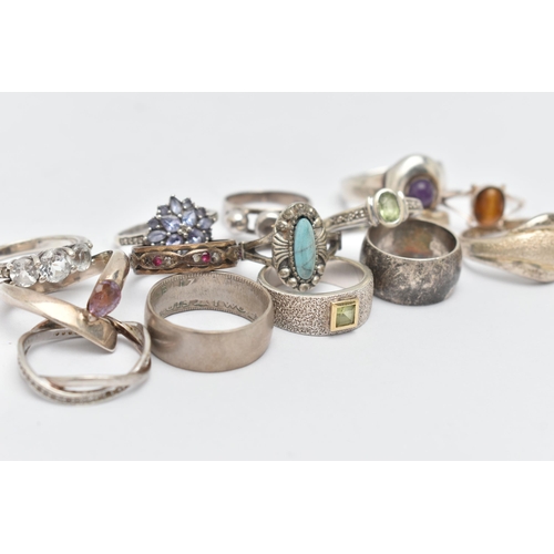 35 - AN ASSORTMENT OF SILVER AND WHITE METAL RINGS, to include two silver gem set rings, both hallmarked,... 