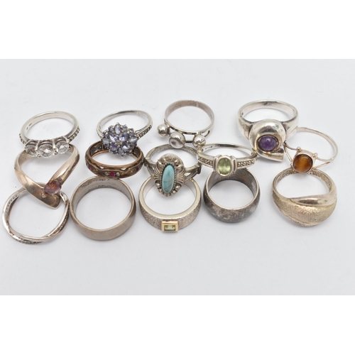 35 - AN ASSORTMENT OF SILVER AND WHITE METAL RINGS, to include two silver gem set rings, both hallmarked,... 