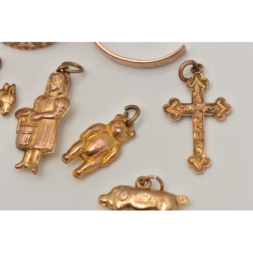 43 - A SELECTION OF YELLOW METAL ITEMS, to include an early 20th century foliate embossed cross pendant, ... 