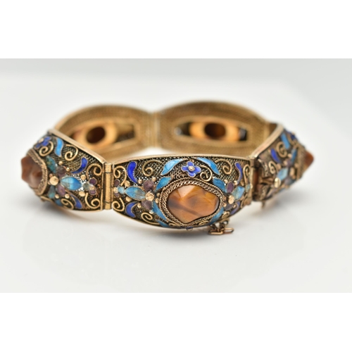 58 - A GEMSET BRACELET, comprised of five domed panels with filigree and enamel detail, each panel set wi... 