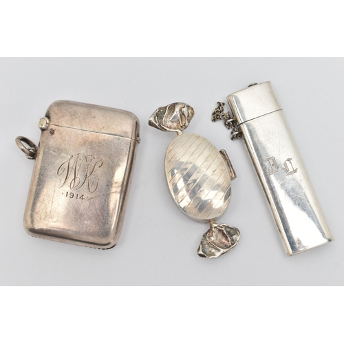 70 - A SILVER VESTA CASE, A NEEDLE CASE AND A PILL BOX, polished rectangular vesta case with engraved ini... 