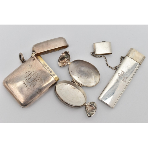 70 - A SILVER VESTA CASE, A NEEDLE CASE AND A PILL BOX, polished rectangular vesta case with engraved ini... 