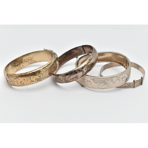 80 - FOUR BANGLES, to include two silver foliage pattern hinged bangles, both fitted with push button cla... 