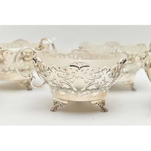 114 - A GEORGE VI SILVER AND FROSTED GLASS LINED DESSERT SET, comprising a fruit bowl and six dishes, each... 