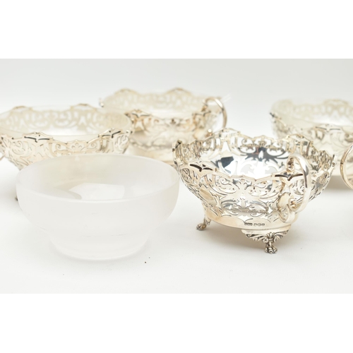 114 - A GEORGE VI SILVER AND FROSTED GLASS LINED DESSERT SET, comprising a fruit bowl and six dishes, each... 