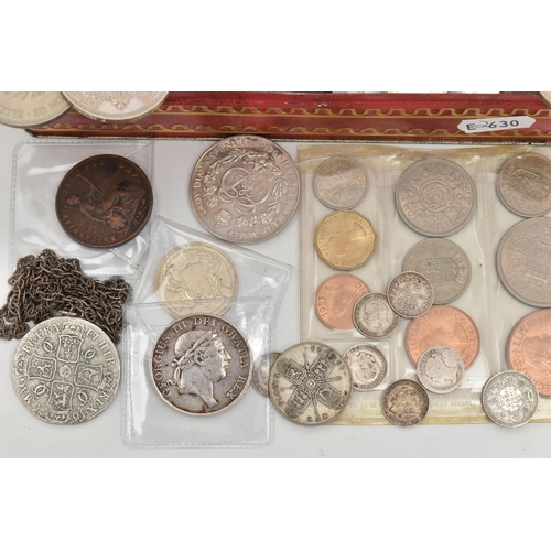 132 - A SMALL TIN OF MIXED COINS, to include a George III bank token of Three Shillings 1813, a small amou... 