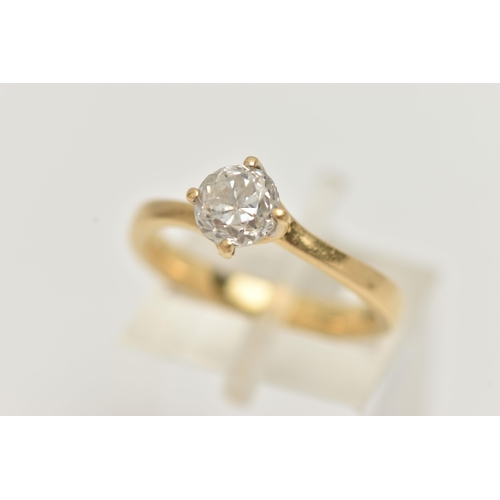 142 - A SINGLE STONE DIAMOND RING, round brilliant cut diamond, four prong set in a 18ct yellow gold twist... 