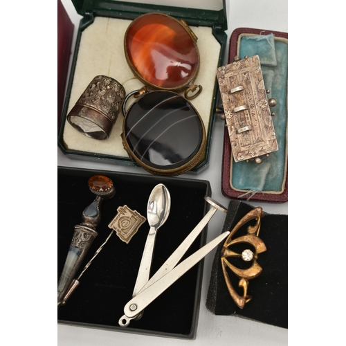 150 - A BOX OF ASSORTED JEWELLERY, to include a small mourning brooch with enamel detail and a plaited hai... 