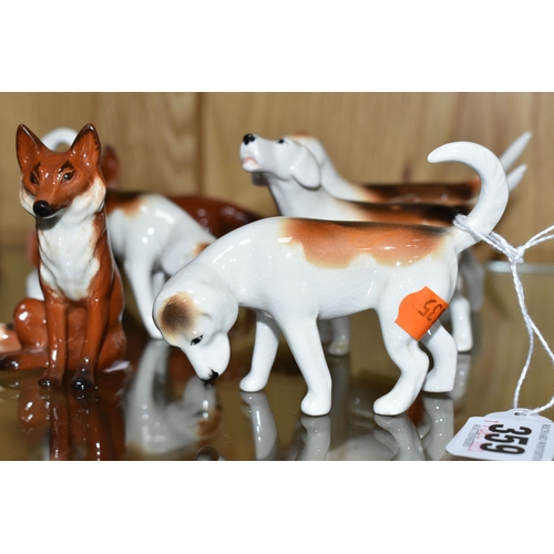 359 - A GROUP OF BESWICK FOXES AND FOXHOUNDS, comprising Foxhounds model nos 941, 942, 943 and 944, and tw... 