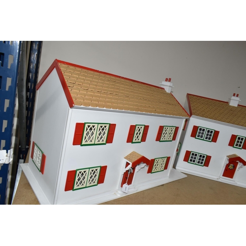 365 - TWO WOODEN DOLL'S HOUSES, modelled as a detached house with side garage, front opening, no furniture... 