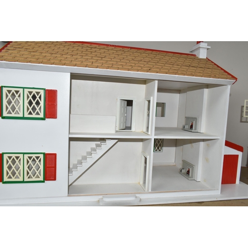 365 - TWO WOODEN DOLL'S HOUSES, modelled as a detached house with side garage, front opening, no furniture... 