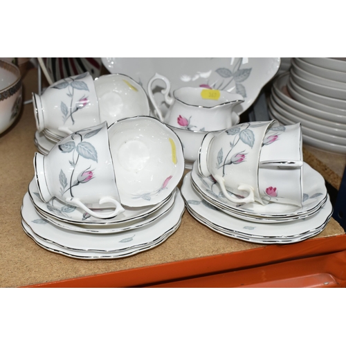 369 - A ROYAL ALBERT 'TRENT ROSE' PATTERN TEA SET, comprising cake plate, milk jug, sugar bowl, six tea cu... 