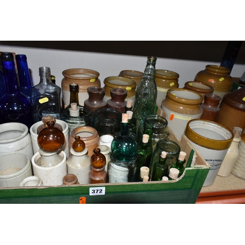 372 - ONE BOX OF VINTAGE GLASS BOTTLES AND STONEWARE FLAGONS, to include four small flagons, eight large s... 