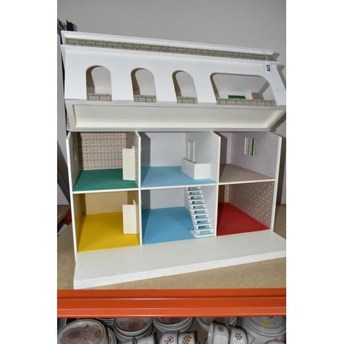 375 - A KIT BUILT HACIENDA STYLE DOLL'S HOUSE, cantilever opening, two storey, unfurnished, no accessories... 