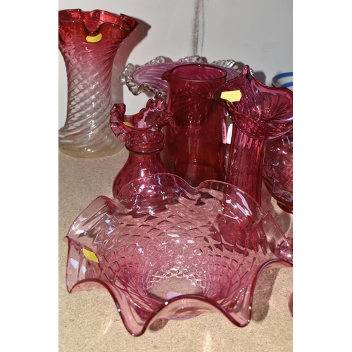 380 - A GROUP OF CRANBERRY GLASS, comprising three frilled edge bowls, a small basket, tumbler (chipped), ... 