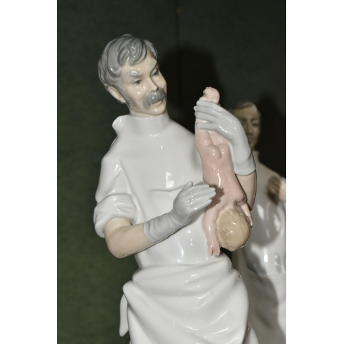 391 - TWO LLADRO FIGURES, comprising The Obstetrician, model no 4763, sculpture Salvador Furió, issued 197... 