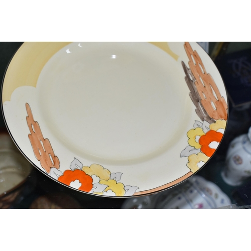 393 - TWO CLARICE CLIFF DINNER PLATES, from her Bizarre range for Wilkinson Ltd, one in 'Orange Capri' pat... 