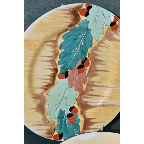 393 - TWO CLARICE CLIFF DINNER PLATES, from her Bizarre range for Wilkinson Ltd, one in 'Orange Capri' pat... 