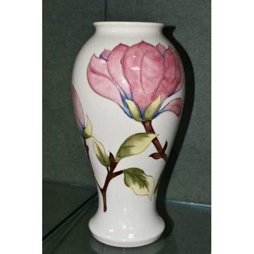 400 - A LARGE MOORCROFT POTTERY VASE, of shouldered form, tube lined in Magnolia pattern on a cream ground... 