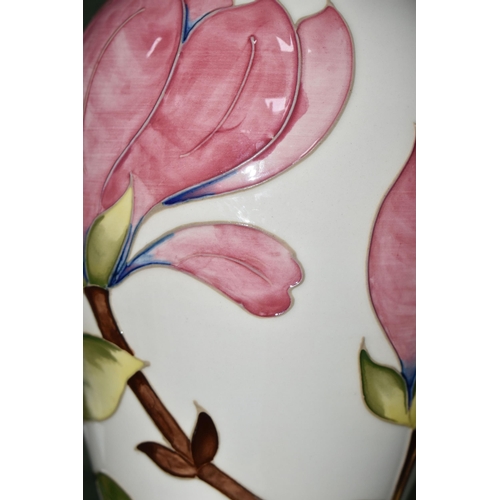 400 - A LARGE MOORCROFT POTTERY VASE, of shouldered form, tube lined in Magnolia pattern on a cream ground... 