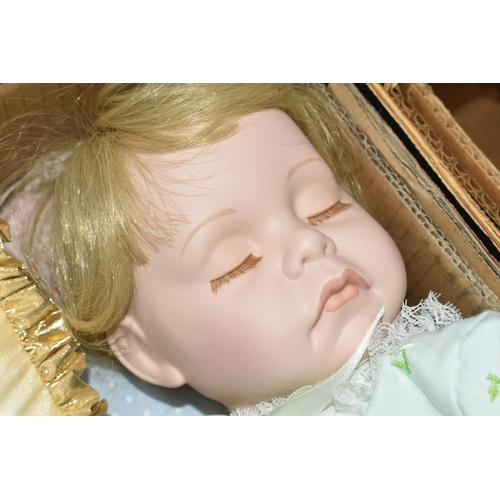 411 - THREE BOXES OF COLLECTABLE PORCELAIN DOLLS,  comprising a Danbury Mint 'Bundle of Joy' 0939, a Frank... 