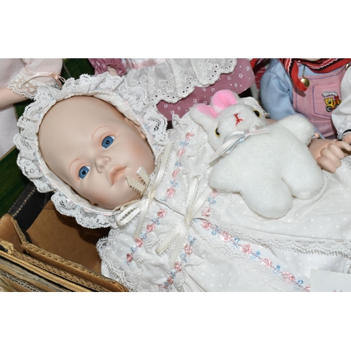 411 - THREE BOXES OF COLLECTABLE PORCELAIN DOLLS,  comprising a Danbury Mint 'Bundle of Joy' 0939, a Frank... 