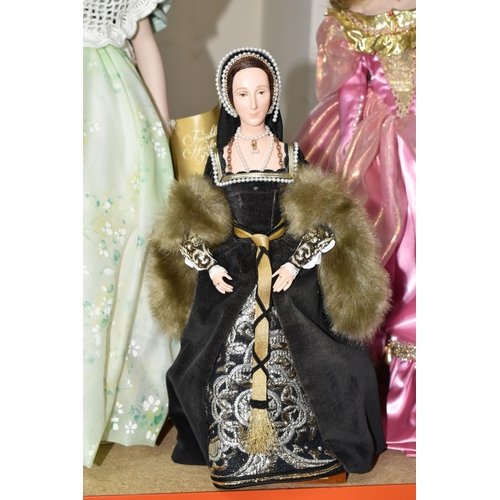 416 - FOUR PORCELAIN COLLECTOR'S DOLLS, Franklin Heirloom Dolls supported by stands, comprising Rapunzel b... 