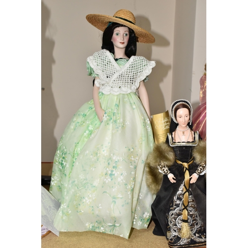 416 - FOUR PORCELAIN COLLECTOR'S DOLLS, Franklin Heirloom Dolls supported by stands, comprising Rapunzel b... 